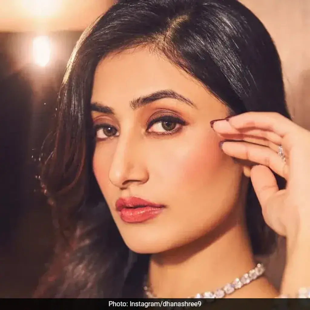 Trolls Attack Dhanashree Verma’s Dubai Post Amid Chahal Podcast Buzz and Bigg Boss 19 Rumors
